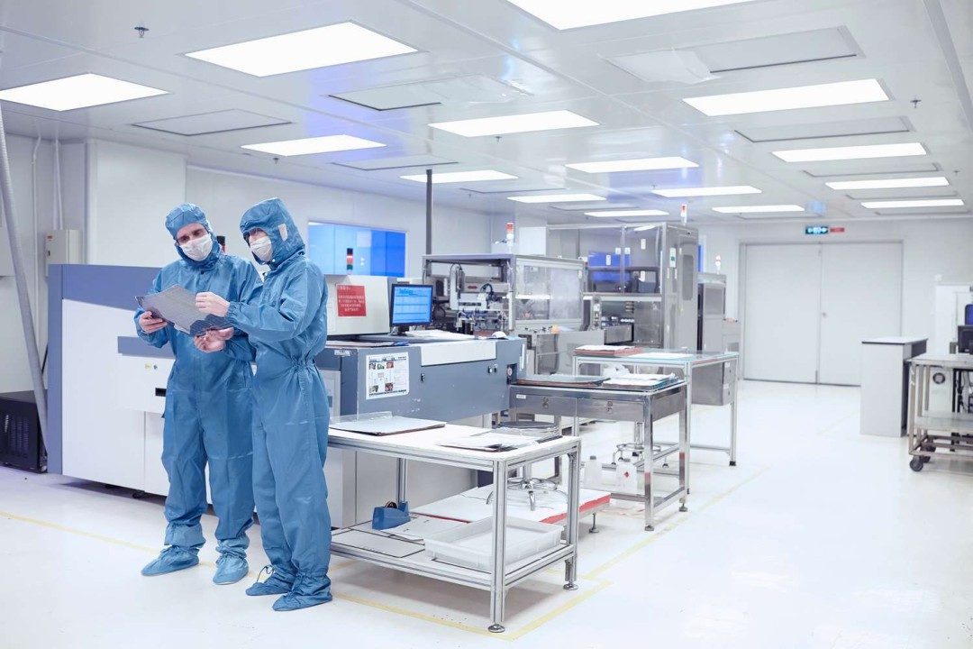 Cleanroom technicians at Lyoworks facility